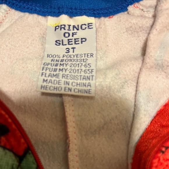 Red, Green, Blue, and Orange Prince of Sleep Dinosaur Footie Pajamas - Picture 3 of 3